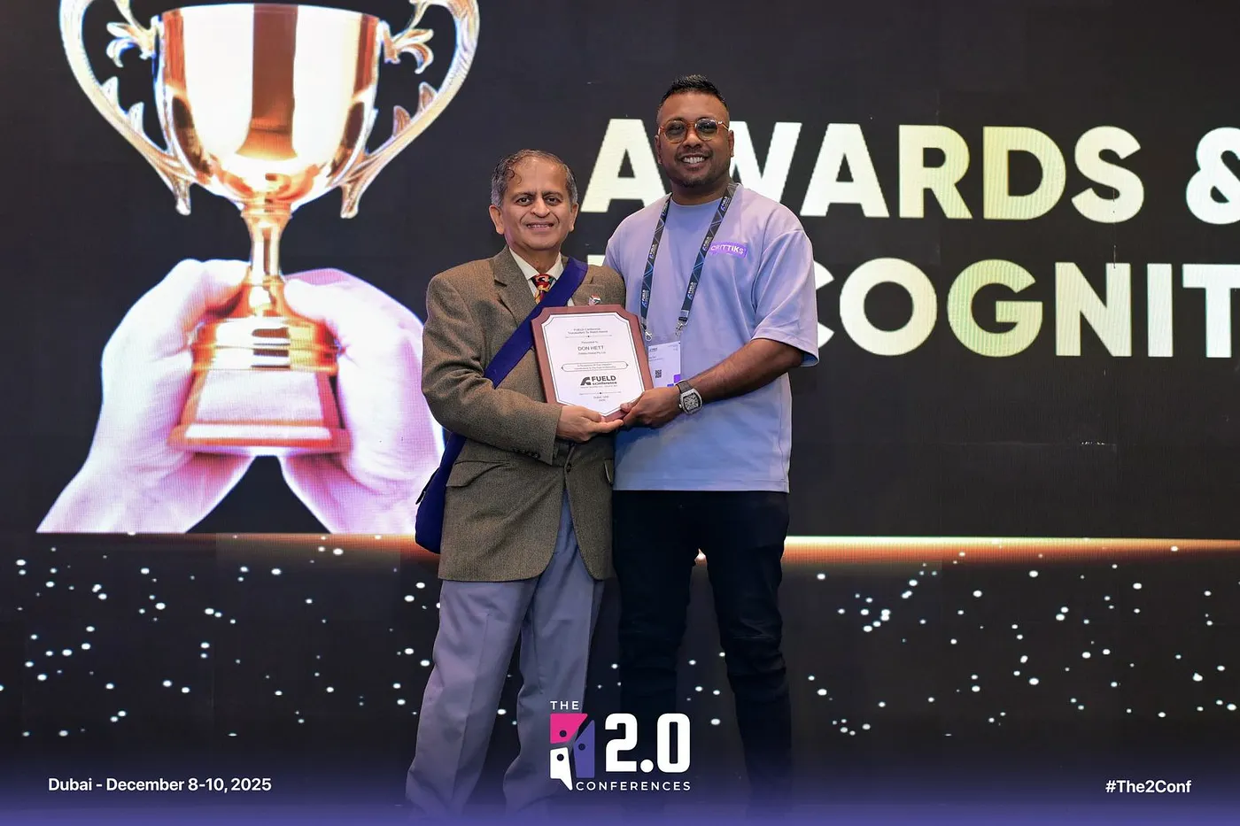 Don Hett receiving recognition at the FUELD Conference in Dubai, December 2025
